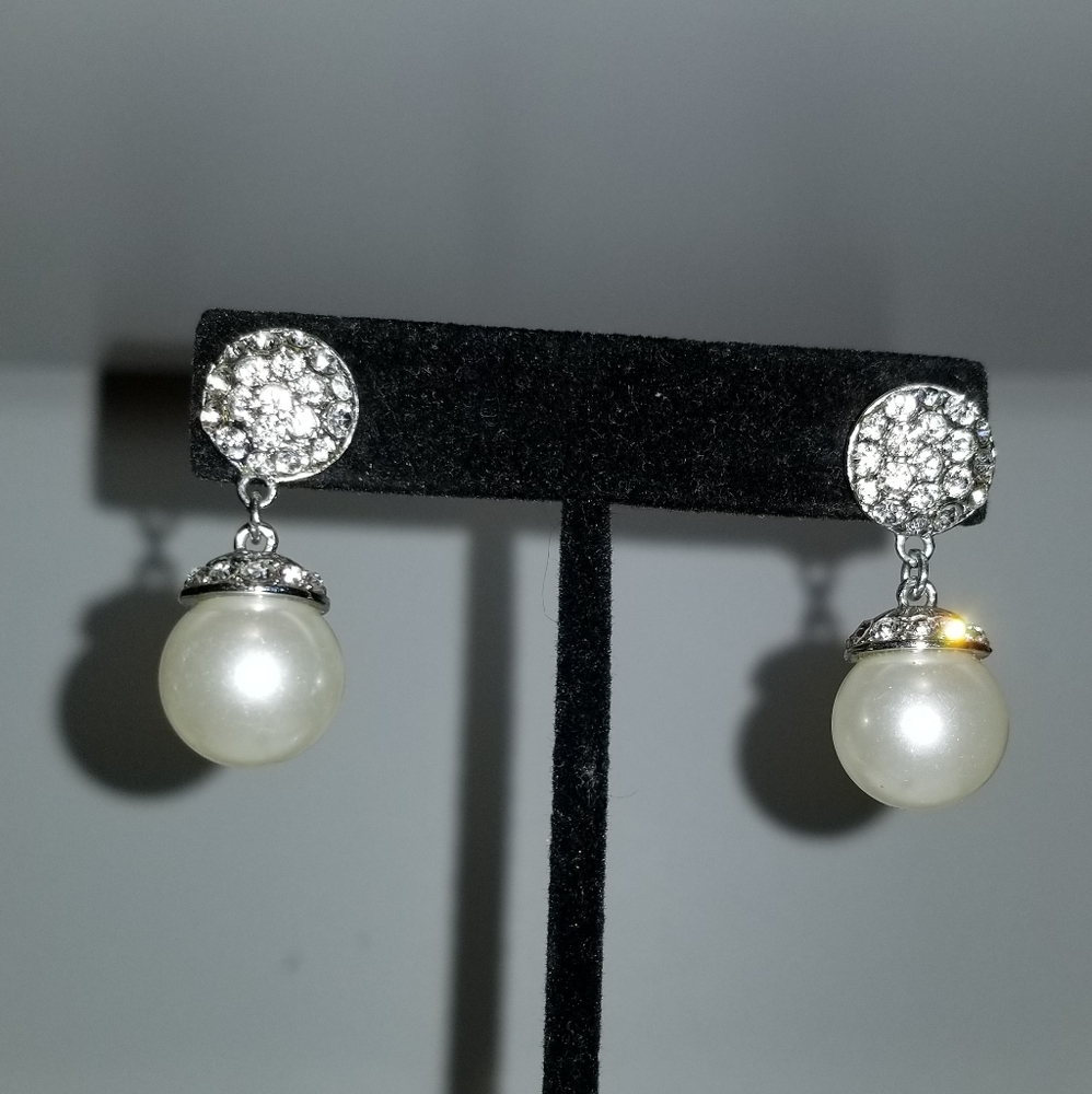 Pearl and white stone earrings